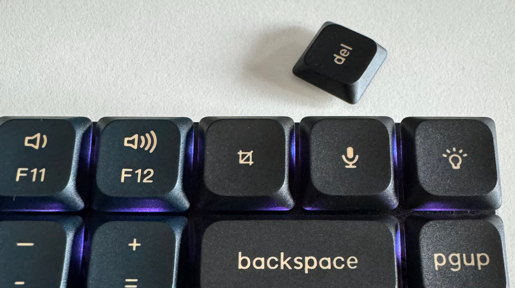My Keychron K3 Max keyboard
    with a mic key replacing the original Del key