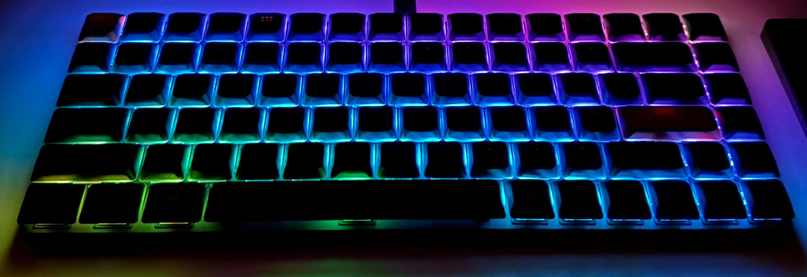 The Keychron K3 Max in the dark with
    RGB lights on